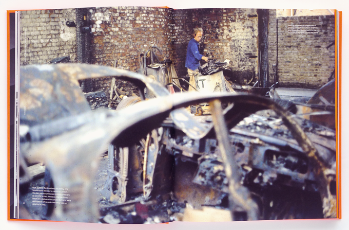 Spiekermann clearing up his workshop after the fire